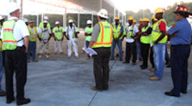 Outside construction tail-gate safety meeting.