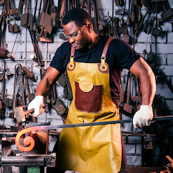 worker using heavy tools