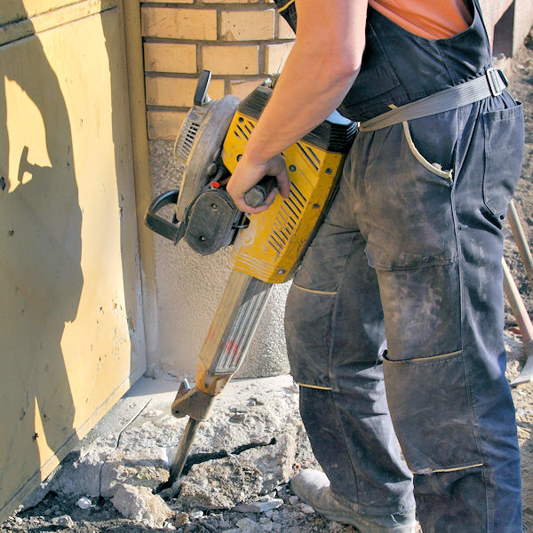 Image showing an employee using a jack hammer 