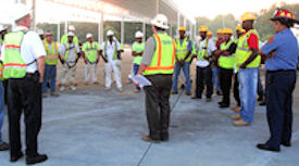 Image showing an outdoor training presentation in which trainer is answering questions