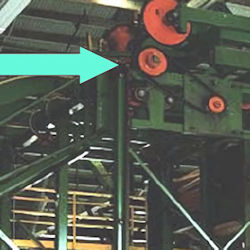 Image showing a pully and belt located above the floor and out of reach for safety