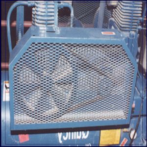 Image of wire screen guarding moving parts of a machine.