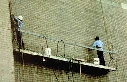 workers on suspended scaffold.