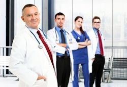 Four medical team members standing together