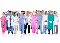 large group of various medical workers lined up 