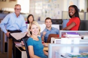 Image of a group of employees with smiling faces