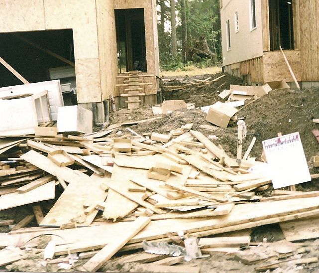 A construction site with material all over causing a hazard.