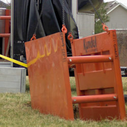 Installing a trenchbox to protect workers from cave-ins