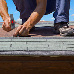 Worker on roof too close to the edge