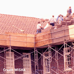 Several workers in a well-built catch platform