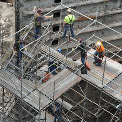 workers on supported scaffold