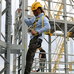 worker at height safely working with fall protection