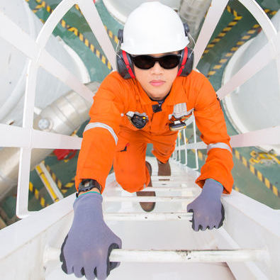 Worker using a ladder