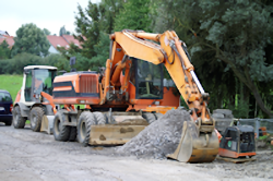 Heavy equipment moving gravel