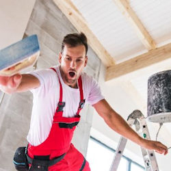 Worker falling off ladder