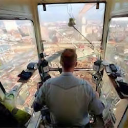 Employee operating a crane