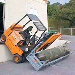 Forklift fell over edge of loading dock with a BOMB that fortunately did not explode