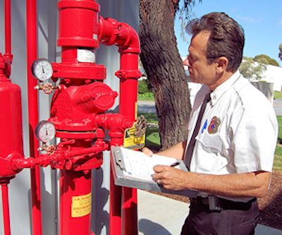 Fire Marshall checking water supply