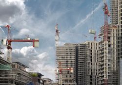 crane operating in downtown city