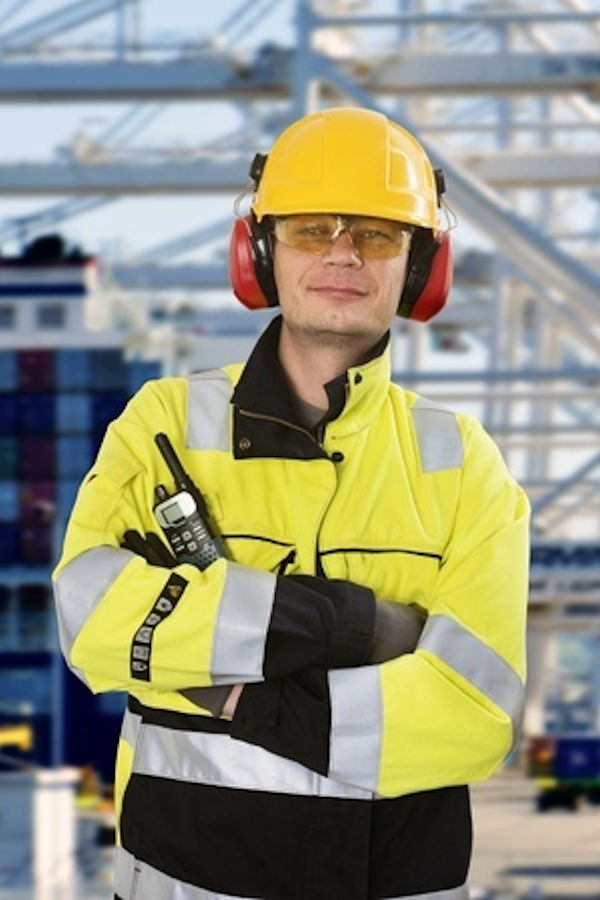 Worker in full PPE pepared for a task