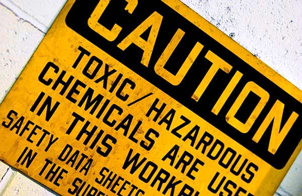 Warning sign informing others of toxic hazardous conditions