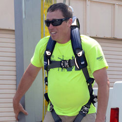 Image of worker wearing fall protection equipment