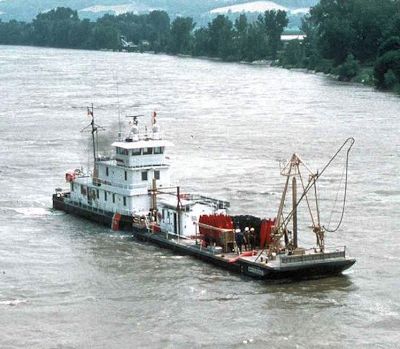 Tugboat pushing a barge