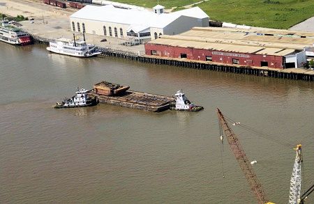 Image of barge being raised after a collision