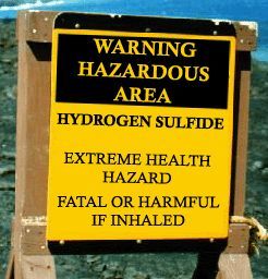 Sign warning those who enter that  it is a Hydrogen Sulfide Hazardous area