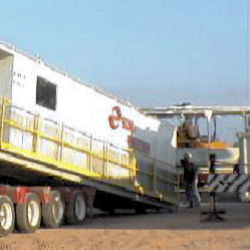 Loading the doghouse onto a trailer during the rig down phase