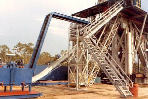 Drilling rig stairway with handrails and guardrails